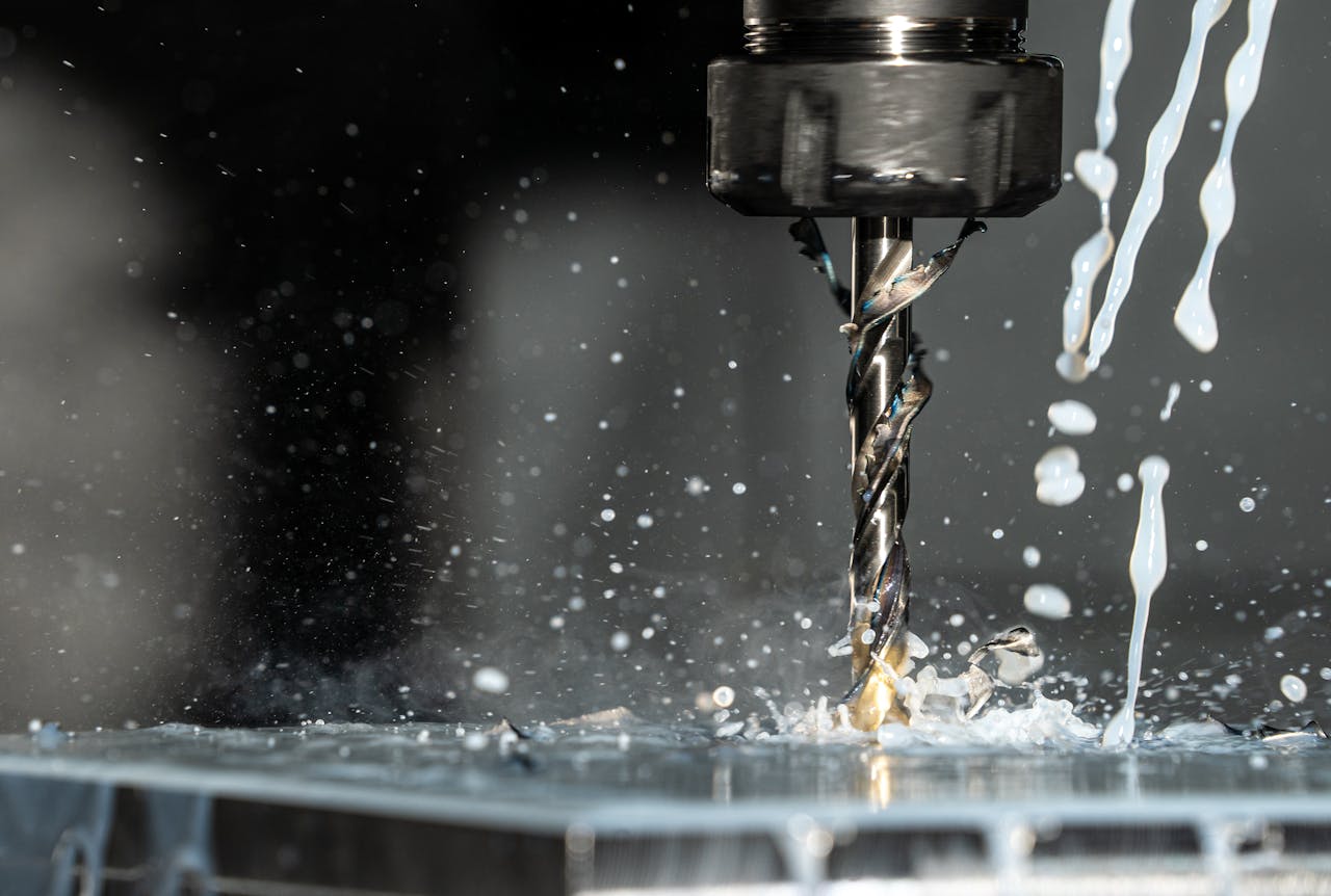 pexels-photo-8956313 Close Up Phot of a CNC Milling Machine with Metalworking Fluid